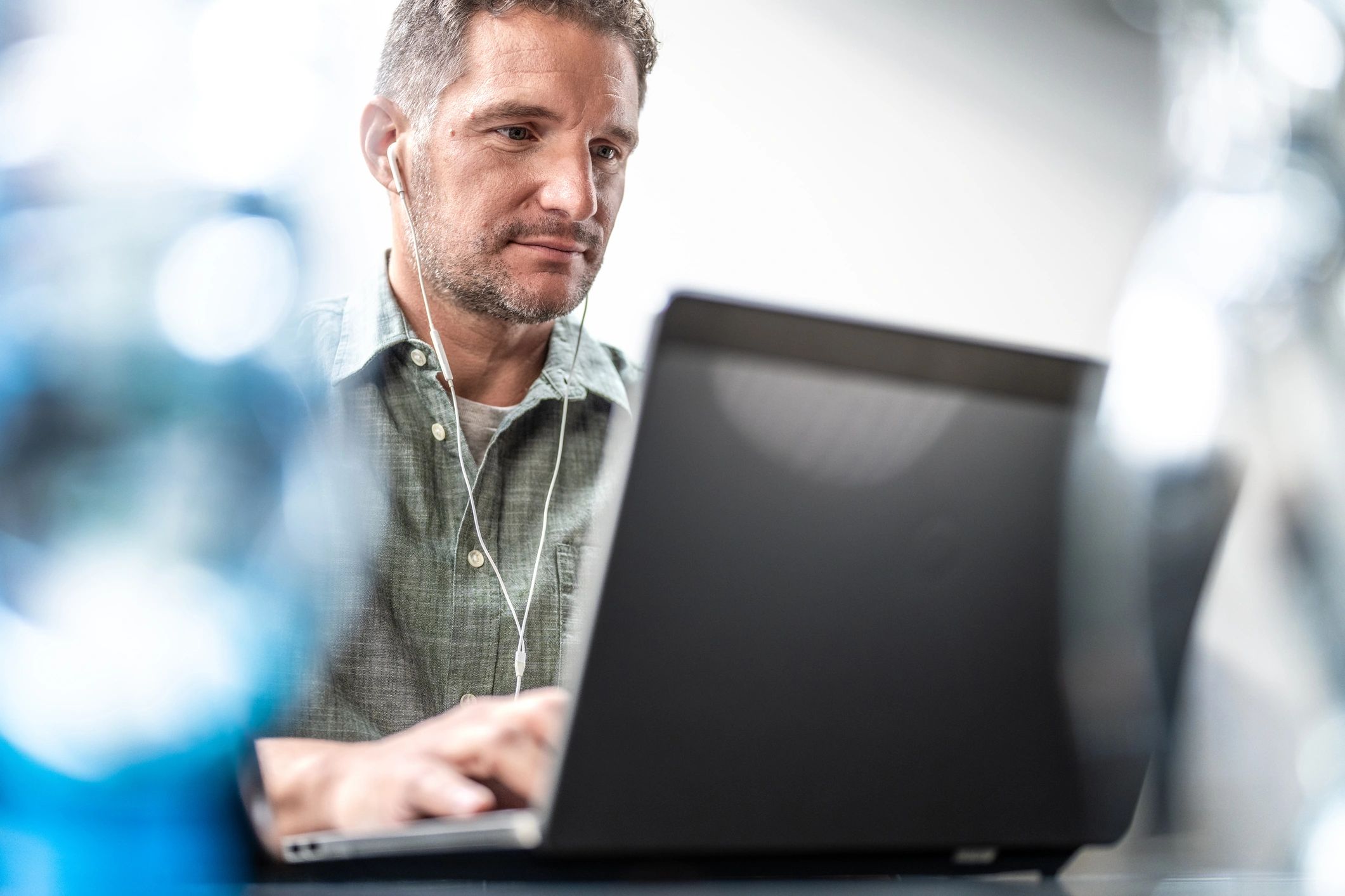 Support professional working on a laptop