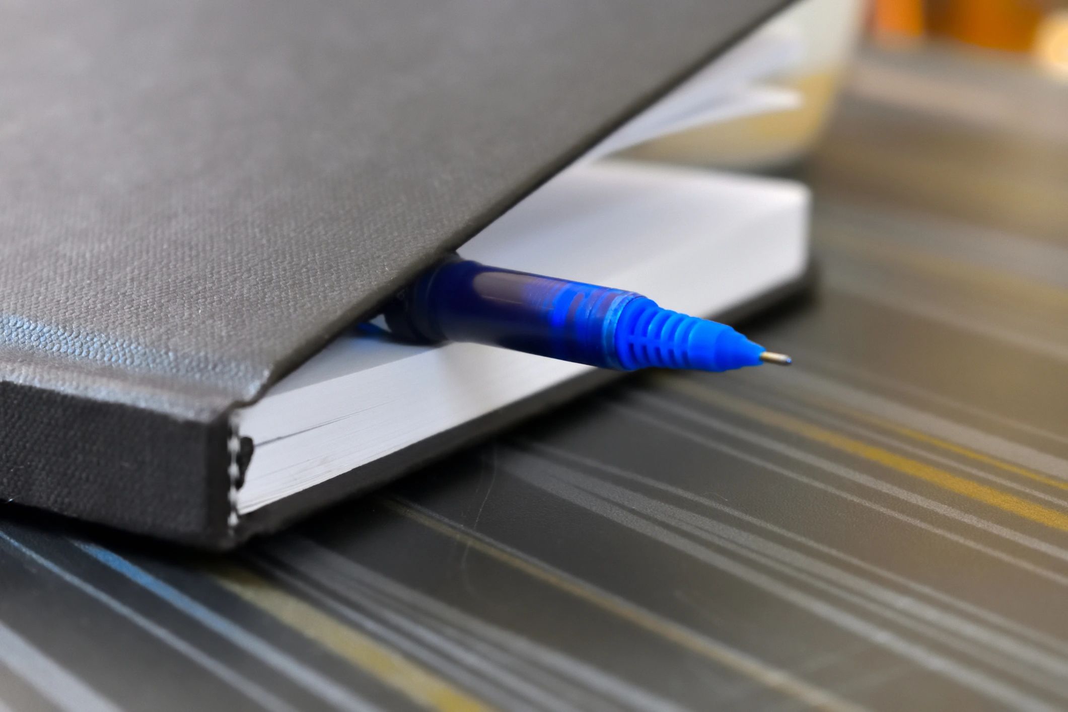 Desk with business paperwork and writing tools